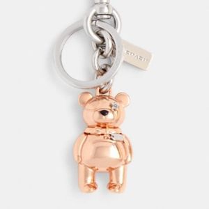 Coach rose gold bear keychain